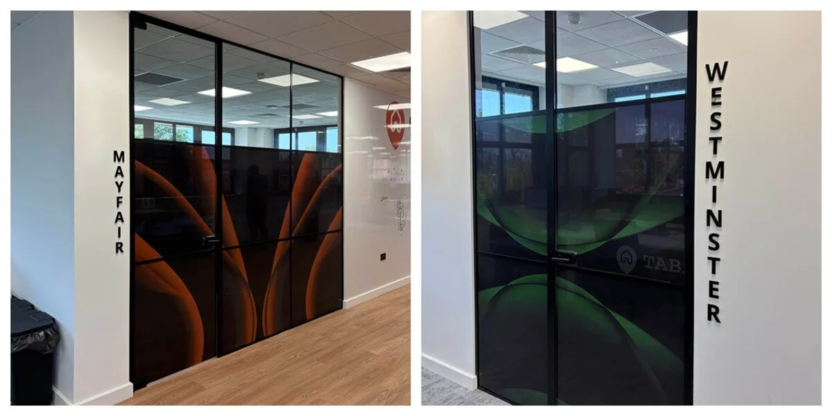 Custom Contravision window graphics and 3D acrylic room lettering installed on boardroom glass partitions by FASTSIGNS St Albans.